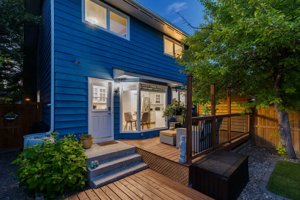 Backyard deck of a Calgary home at dusk