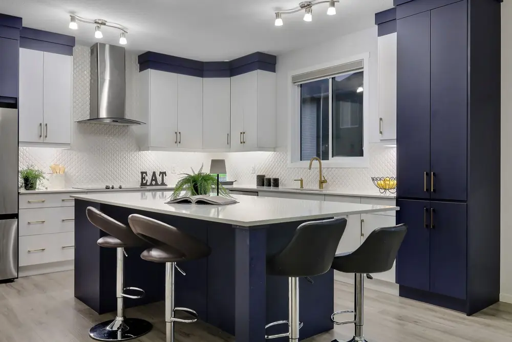 Navy and white kitchen with large island